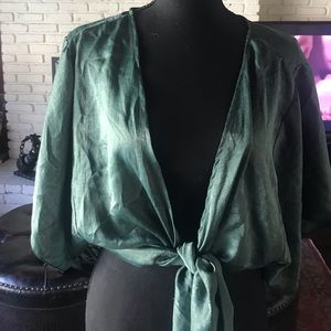 Size M. Pretty teal!